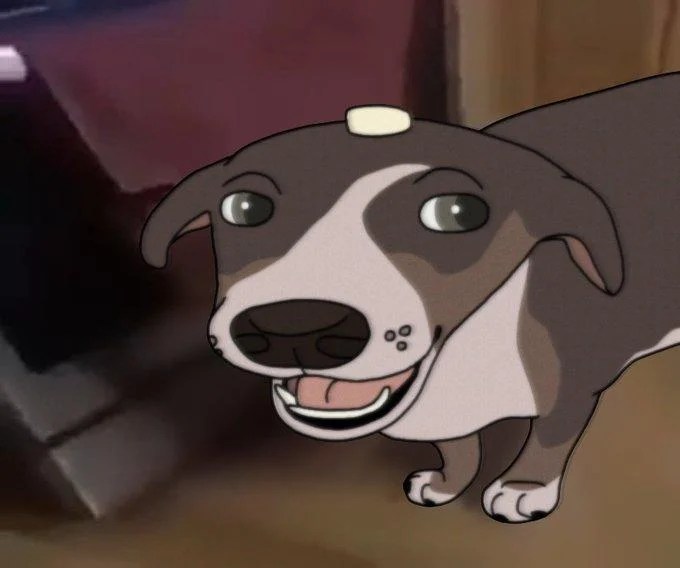 Butterdog — Cartoon pit bull dog smiling with butter on its head over a blurred background