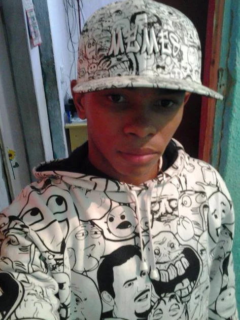 Cancer — Person wearing a hat and hoodie printed with meme rage faces
