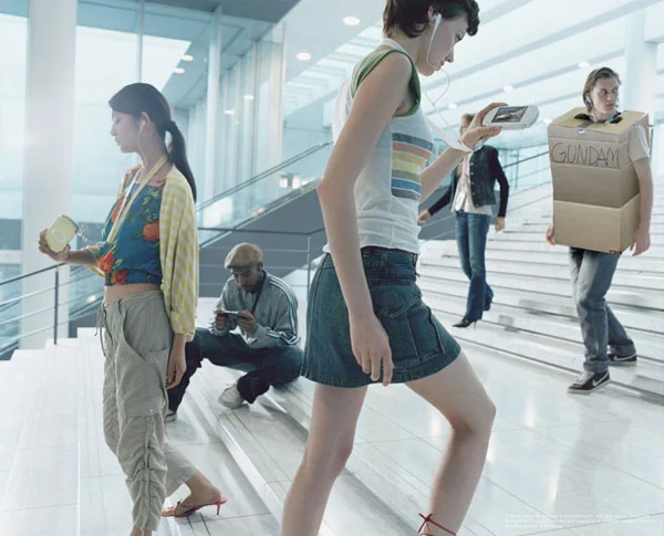 Photoshopped image of cardboard box Gundam inserted into stylish stairs advertisement