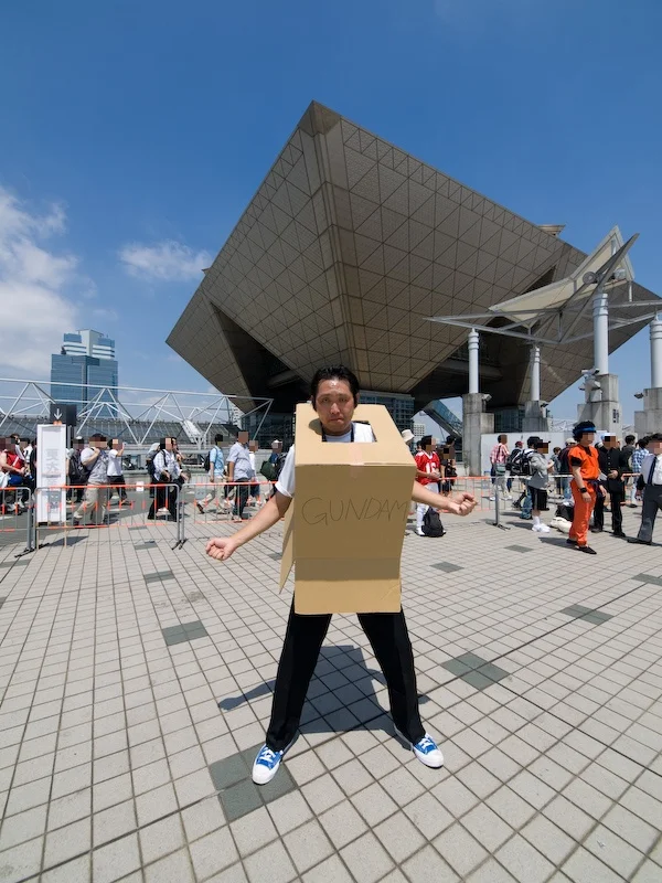 Cardboard Box Gundam — Japanese man in cardboard GUNDAM box cosplay outside Tokyo Big Sight
