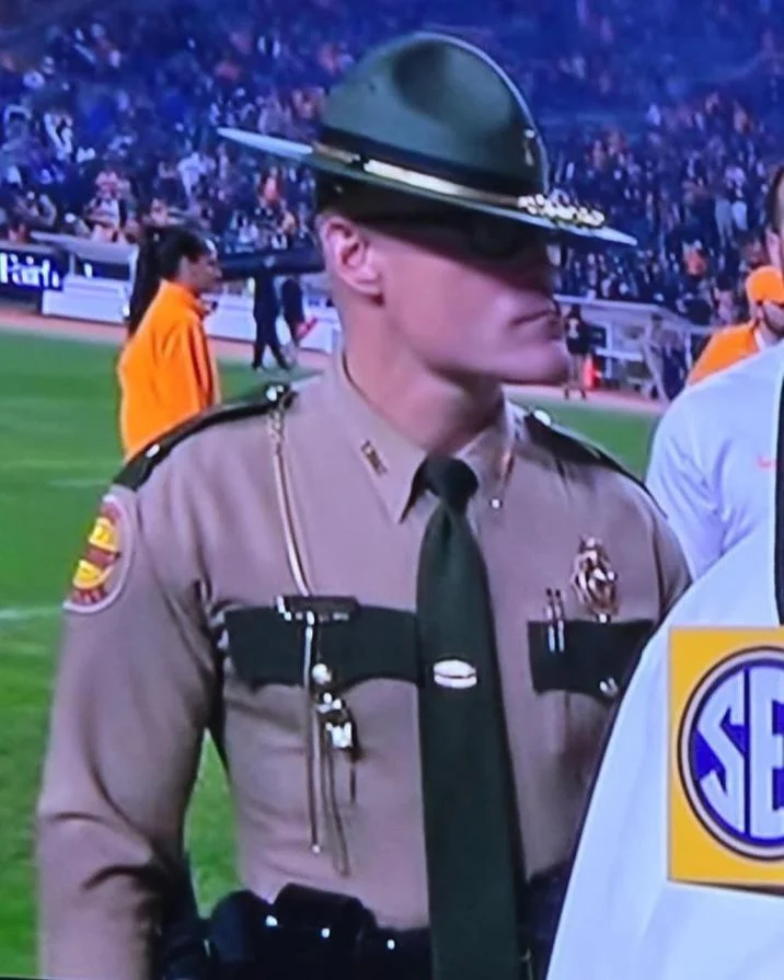 Cassius Thundercock State Trooper — Tennessee state trooper in full uniform standing at an SEC football game