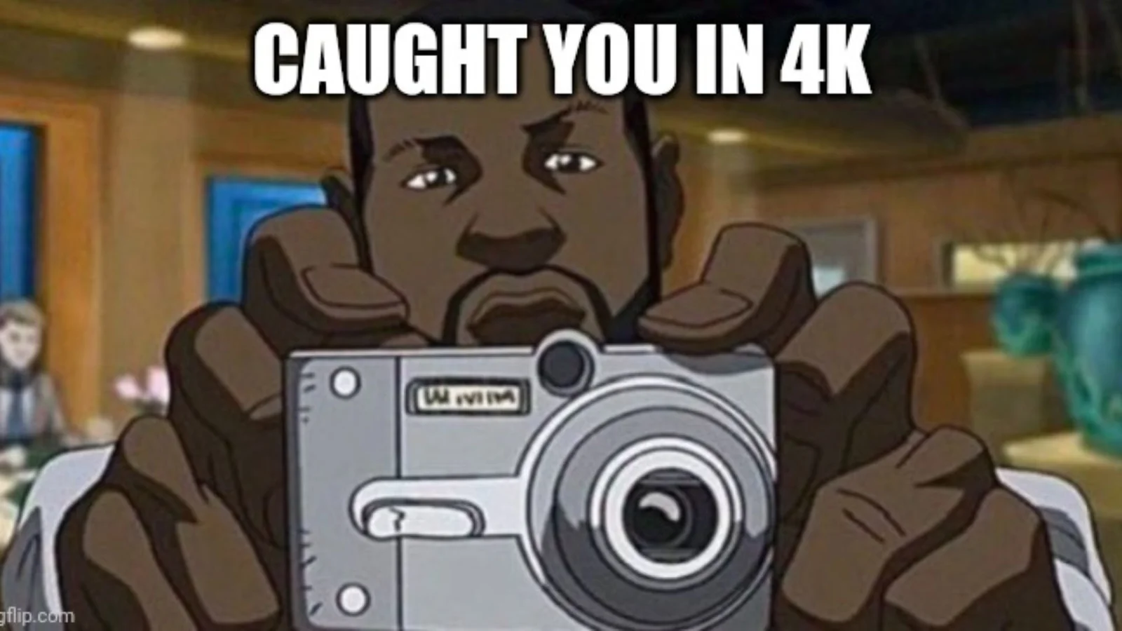 Caught In 4K — Animated character holding 4K camera with "CAUGHT YOU IN 4K" text overlay