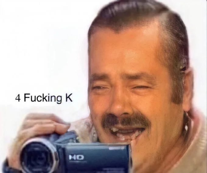 Caught In 4K — Person holding camcorder with explicit "4 Fucking K" text overlay