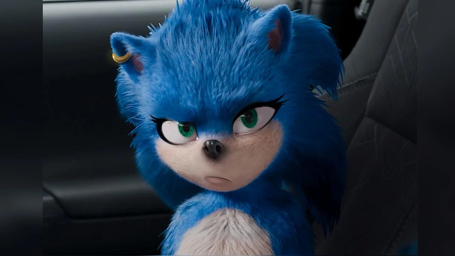 Cgi Sonic Edits — Original CGI Sonic movie design with realistic fur and small green eyes sitting in car