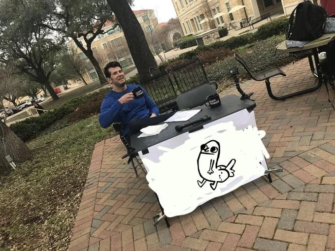 Sign reads PEE IS STORED IN THE BALLS CHANGE MY MIND in absurdist humor format.