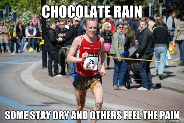 A marathon runner with Impact-font text overlaying the Chocolate Rain refrain about staying dry and feeling pain.