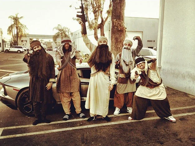 Chris Brown and friends dressed in stereotypical costumes for Halloween