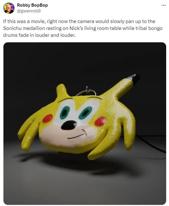 Chris Chan's Sonichu Medallion Curse — Tweet showing a yellow Sonichu medallion on a dark surface with a cinematic caption