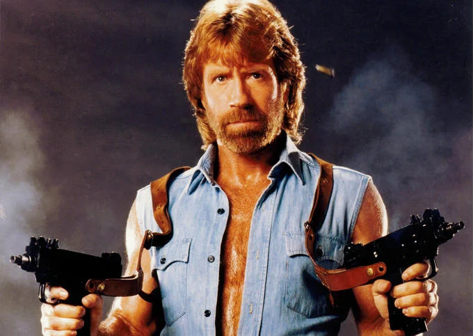 Chuck Norris as Cordell Walker wearing a cowboy hat in Walker, Texas Ranger poster
