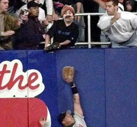 Cigar Guy photoshopped into a baseball fan-interference photo at Yankee Stadium
