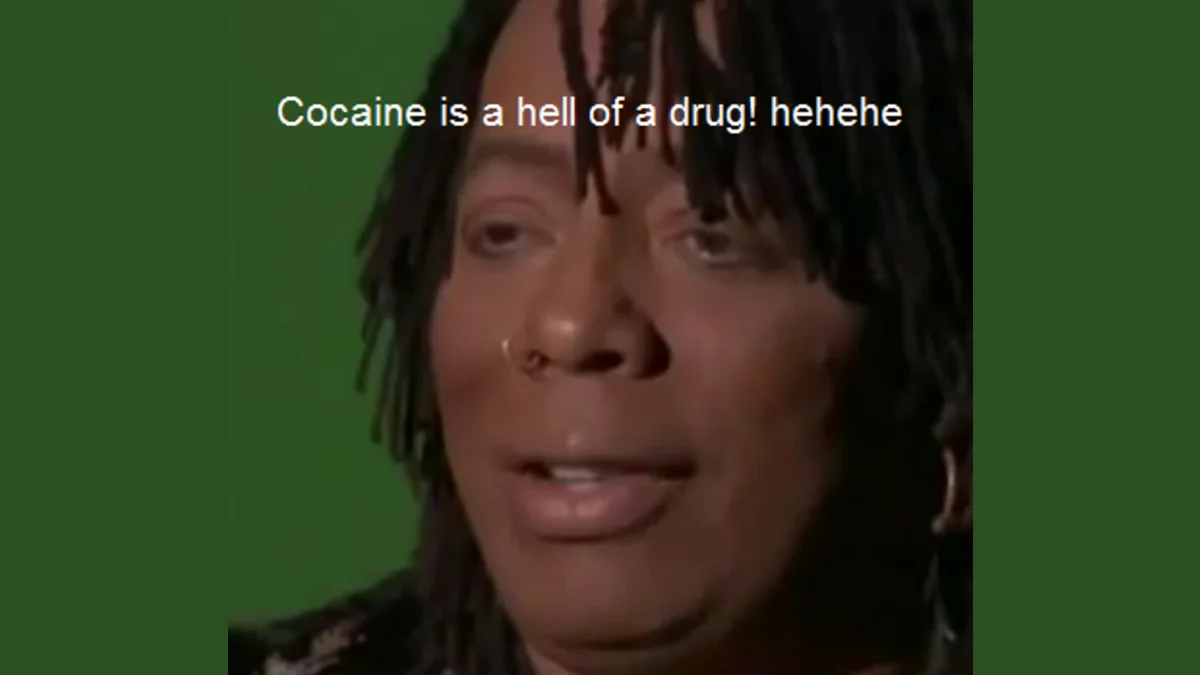 Rick James smiling with caption 'Cocaine is a hell of a drug! hehehe'