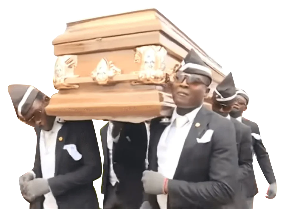 Ghanaian pallbearers in formal black suits and gray hats perform the Coffin Dance while carrying a polished wooden coffin against a dark background.