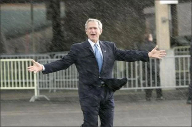 Come At Me Bro — George W. Bush standing in the rain with arms outstretched