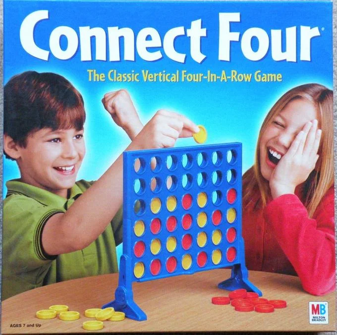 Full Milton Bradley Connect Four box art with boy and girl playing the game