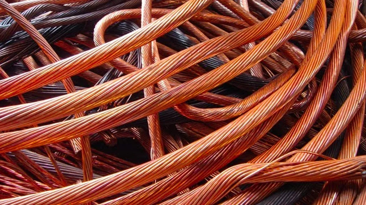 Copper Wiring — A pile of tangled bare copper wires in reddish-orange color.