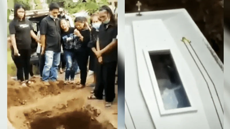 Corpse Waves From Coffin — Split-frame still from Indonesian burial video showing mourners in black at grave and close-up of white coffin with glass window