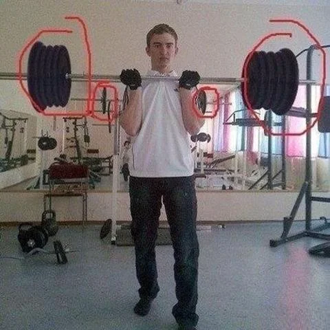 Cringeworthy — Man in gym holding barbell with drawn-on oversized cartoon weight plates