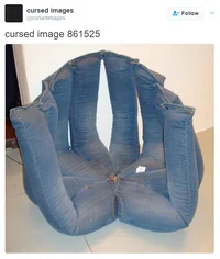 Cursed Images — Blue jeans folded and arranged to form ambiguous head-like shape, creating uncanny disorienting effect.