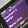 Cyberbullying — Close-up of mobile phone screen showing incoming text from 'baddgirl675' reading 'Ur a loser' timestamped May 14 1:55 pm.