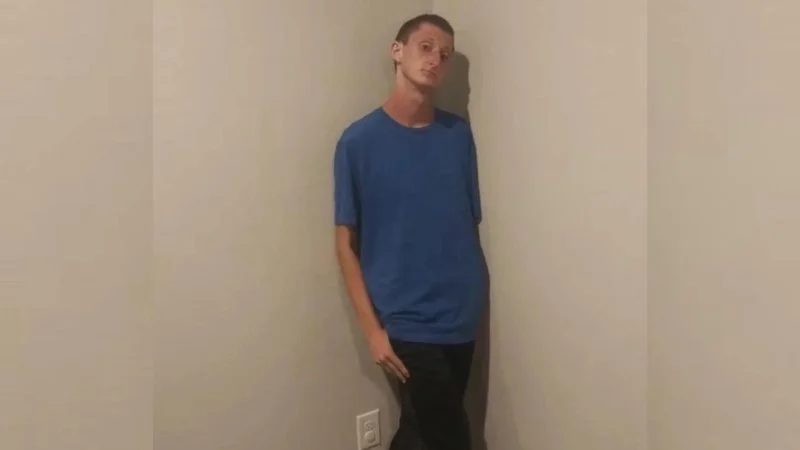 Daniel Larson Standing In A Corner