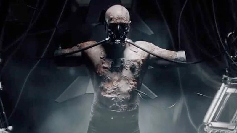 Darth Vader Shards Of The Past Star Wars Fan Film Controversy — Scarred, bald Anakin Skywalker with breathing mask being fitted into Darth Vader suit in fan