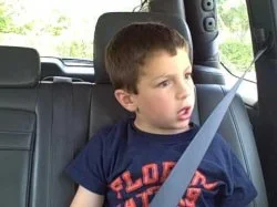 David After Dentist iconic shocked expression in car seat