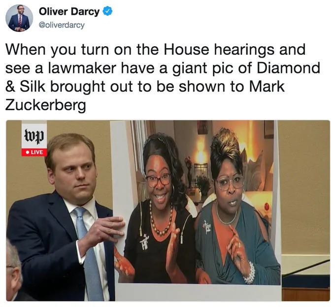 Tweet showing lawmaker holding giant Diamond and Silk photo at Zuckerberg House hearing