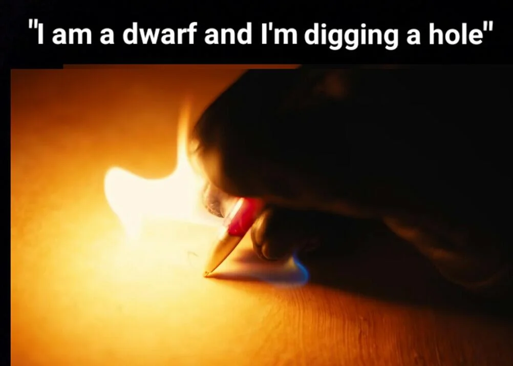 Diggy Diggy Hole — Close-up of a hand lighting an object on fire captioned with the lyric 'I am a dwarf and I'm digging a hole'