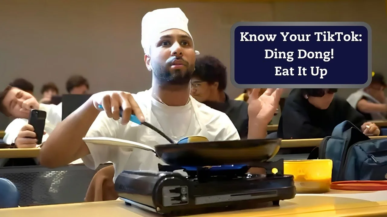 Ding Dong Eat It Up — Person wearing white head covering seated at kitchen table with informational text box identifying source of viral sound.