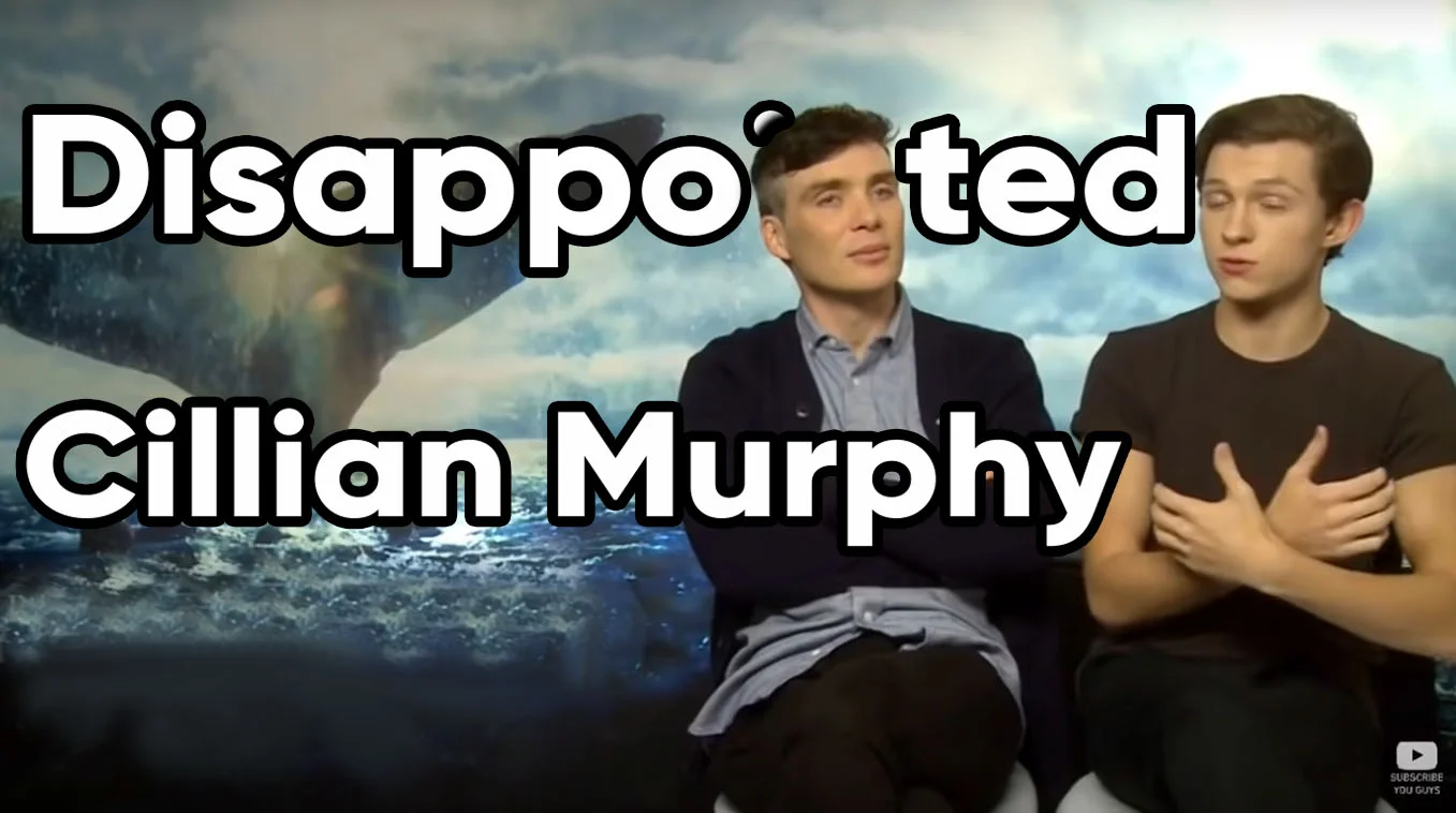 Cillian Murphy sitting beside Tom Holland in an interview with 'Disappointed Cillian Murphy' text overlay
