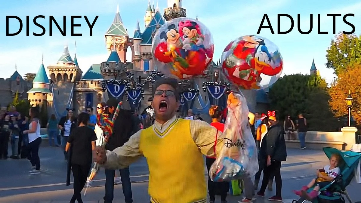 Disney Adults — Man screaming enthusiastically at Disneyland holding Mickey Mouse balloons in front of the castle