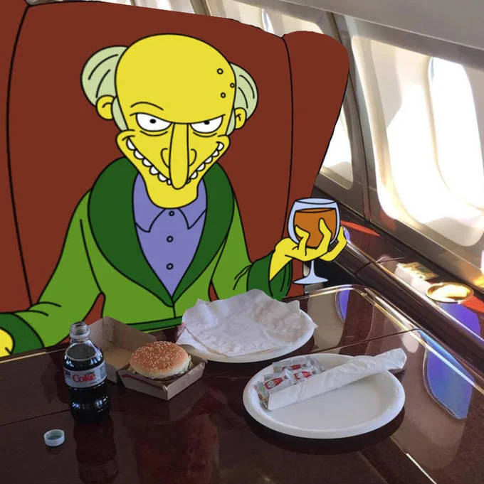 Donald Trump's McDonald's Meal — Photoshop edit replacing Trump with Mr. Burns from The Simpsons eating McDonald's on the plane