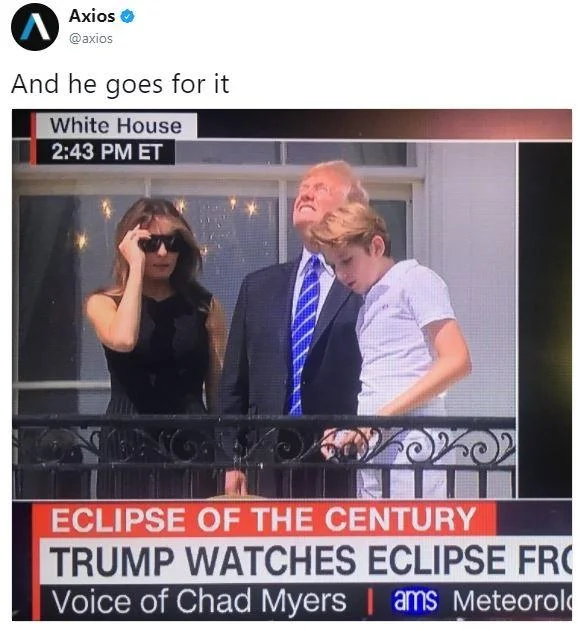 Donald Trump Staring At The Eclipse — Axios tweet showing CNN broadcast of Trump family watching the eclipse from the White House balcony
