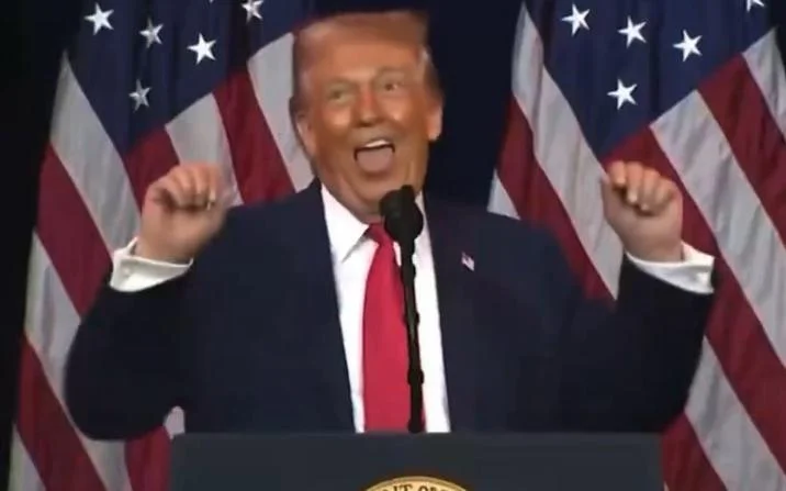 Donald Trump Trans Weightlifter Impression Ahegao Face — Clear video frame of Trump at podium making the weightlifter impression with exaggerated expression