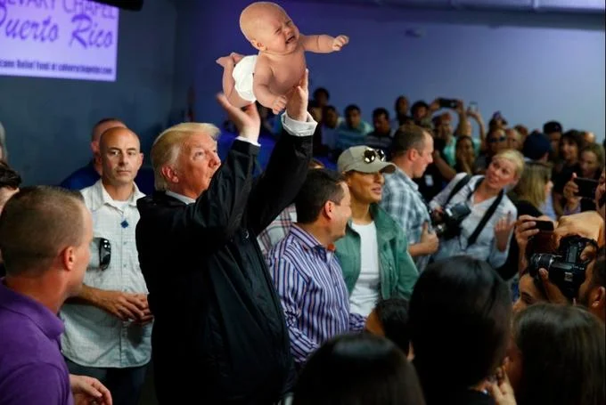 Donald Trumps Paper Towel Toss — Photoshop meme of Trump holding a crying baby instead of paper towels