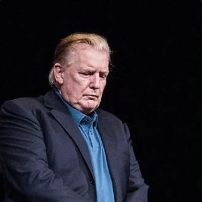 Donald Trumps Slicked Back Hair — Close-up of Donald Trump looking down with slicked-back hair