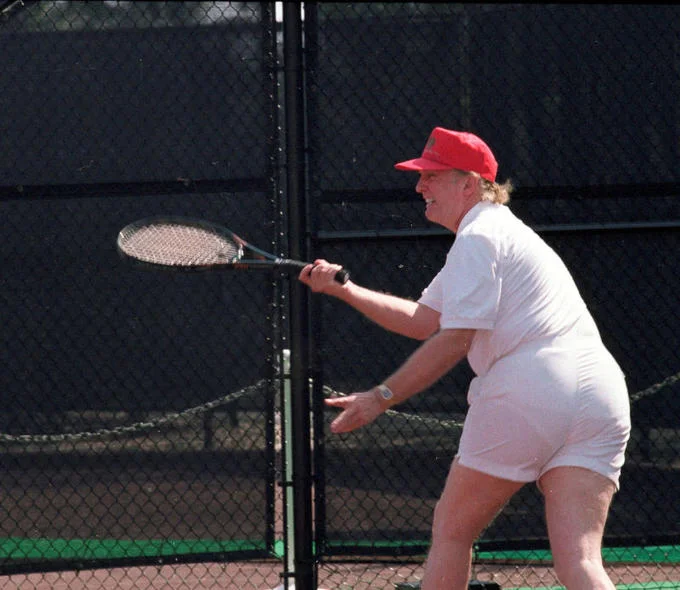Donald Trumps Tennis Photo — Full uncropped photo of Donald Trump playing tennis in white outfit and red cap
