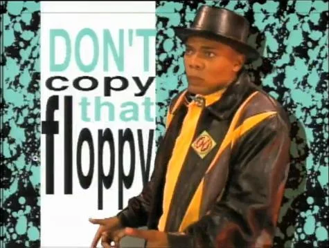 Dont Copy That Floppy — Modern meme remix of the PSA featuring MC Double Def DP against turquoise static background.
