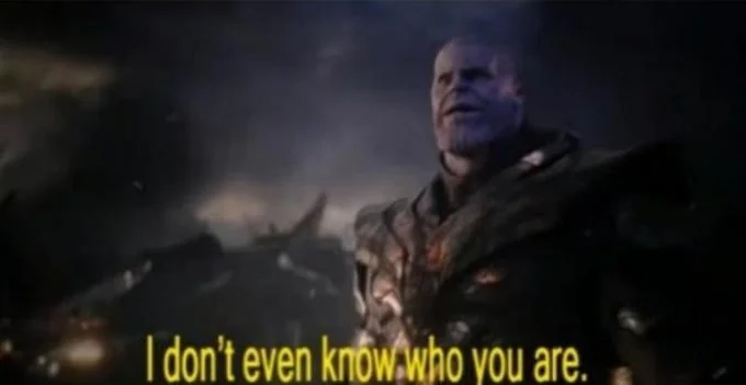 I Don't Even Know Who You Are — Premium quality image of Thanos in ornate armor against moody post-apocalyptic background with white text.