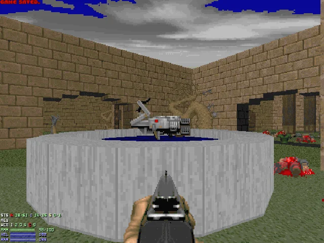 Classic DOOM gameplay screenshot with shotgun aimed at a demon in a walled arena