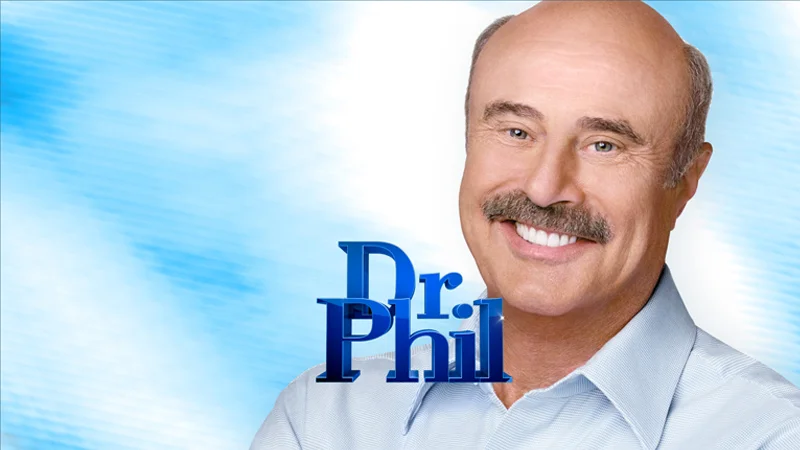 Dr Phil — Dr. Phil McGraw smiling next to the blue Dr. Phil show logo on a light blue background.