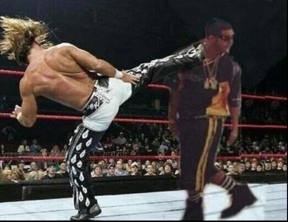 Drake In Dada Drake Lean — Leaning Drake photoshopped receiving a superkick from Shawn Michaels in a WWE ring