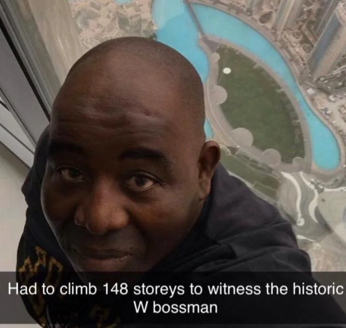 Dub Bossman — Man selfie from skyscraper with caption about climbing 148 storeys to see W bossman
