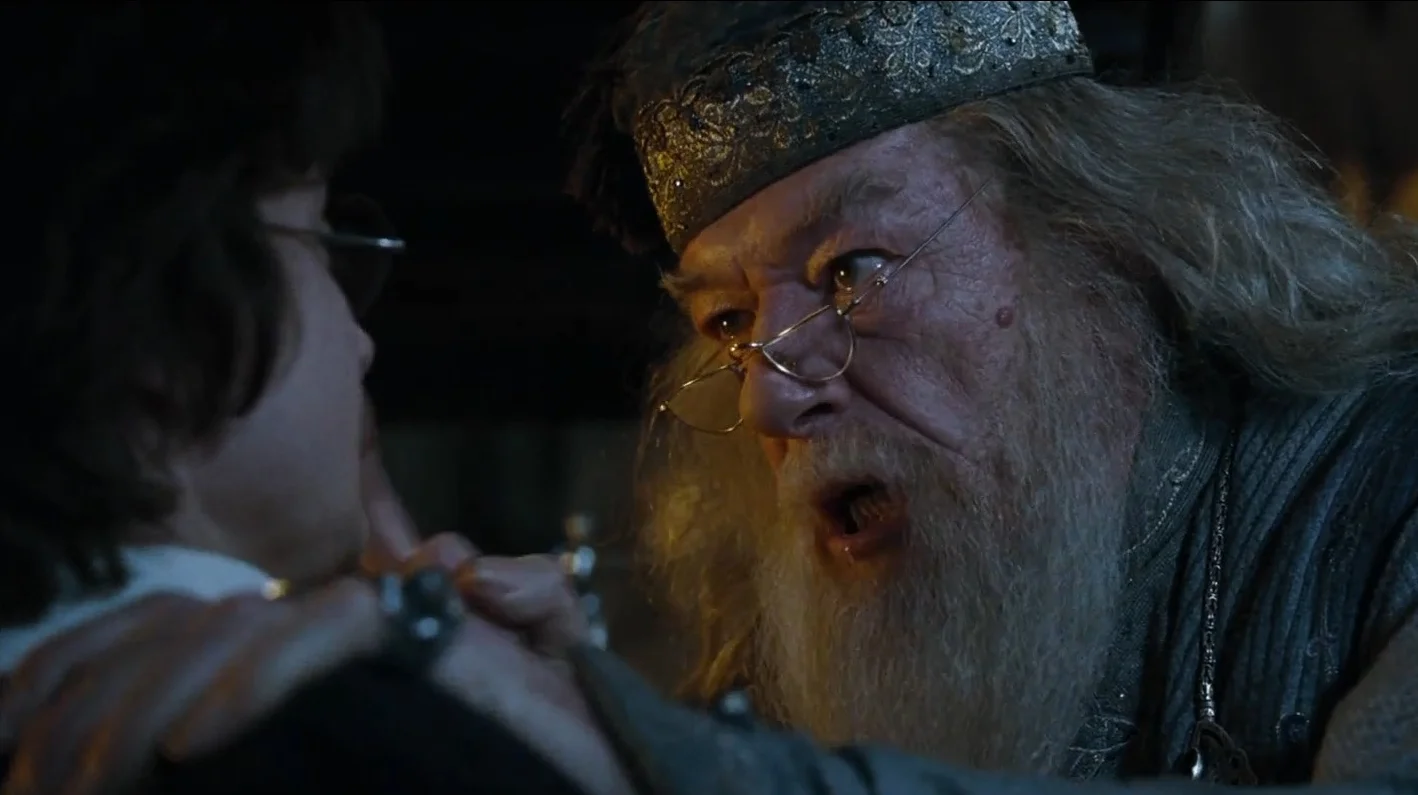 Dumbledore Asked Calmly — Dumbledore grabbing Harry Potter by the shoulders and shouting at him in a film still from Goblet of Fire