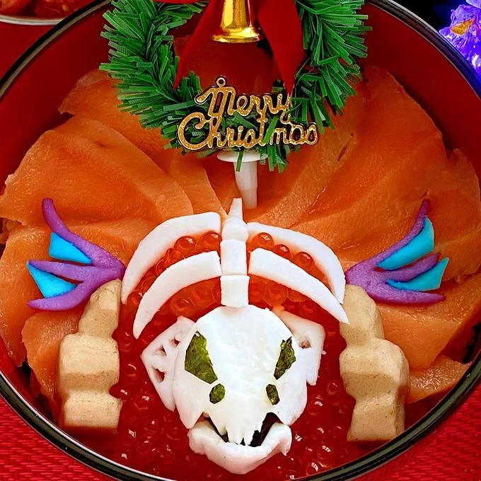 Eat Salmon On Christmas — Elaborate Japanese salmon dish with Christmas wreath and food sculpture of monster skull.