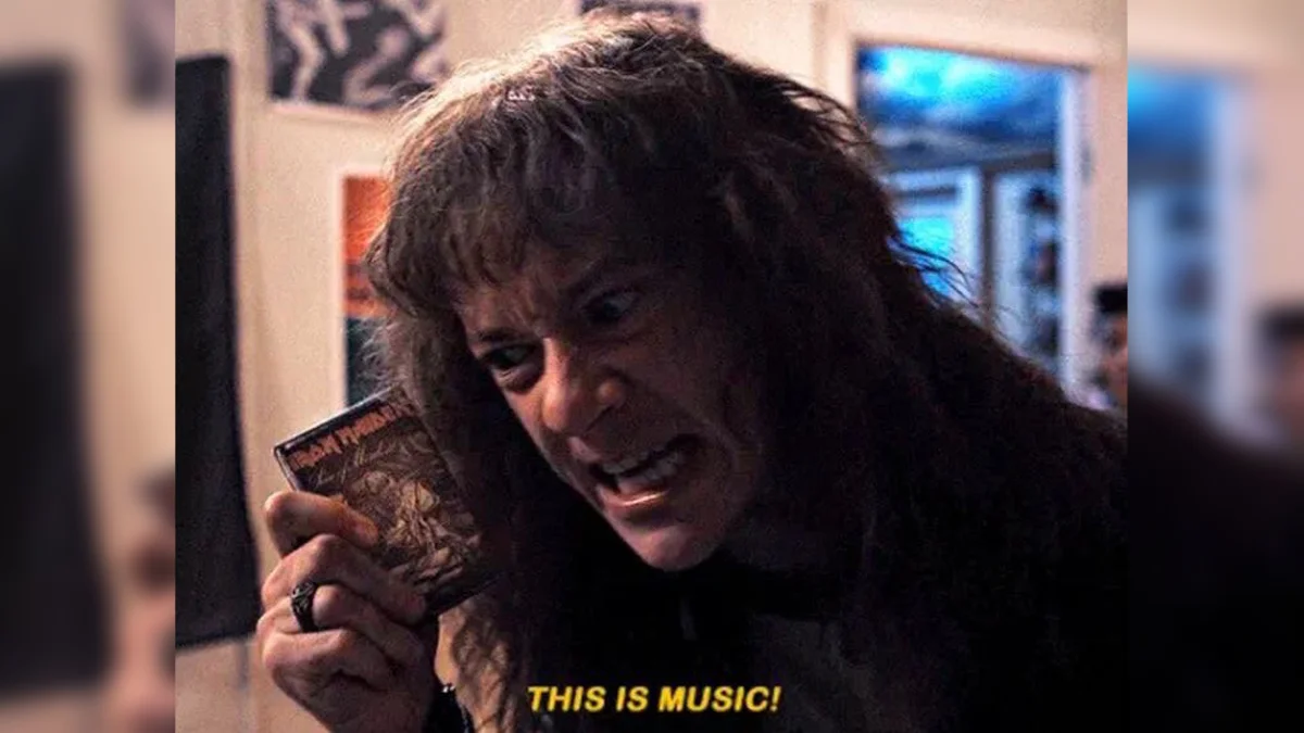 Eddie Munsons This Is Music — Eddie Munson holding an Iron Maiden cassette with the caption 'THIS IS MUSIC!'