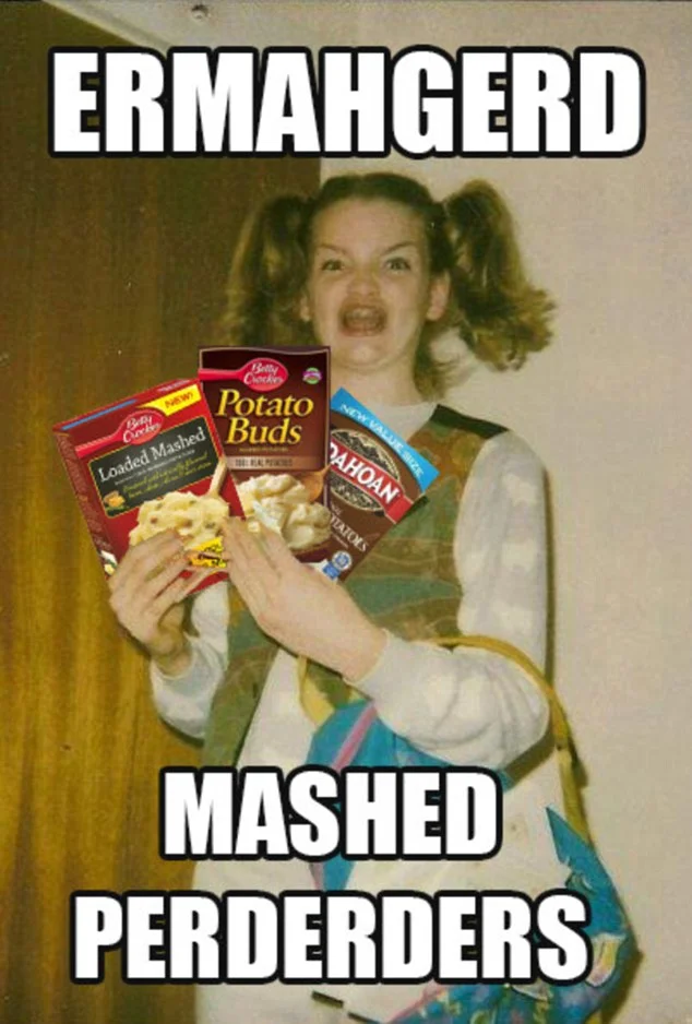 Ermahgerd — Girl with pigtails holding snack packages with excited expression and 'MASHED PERDERS' text.