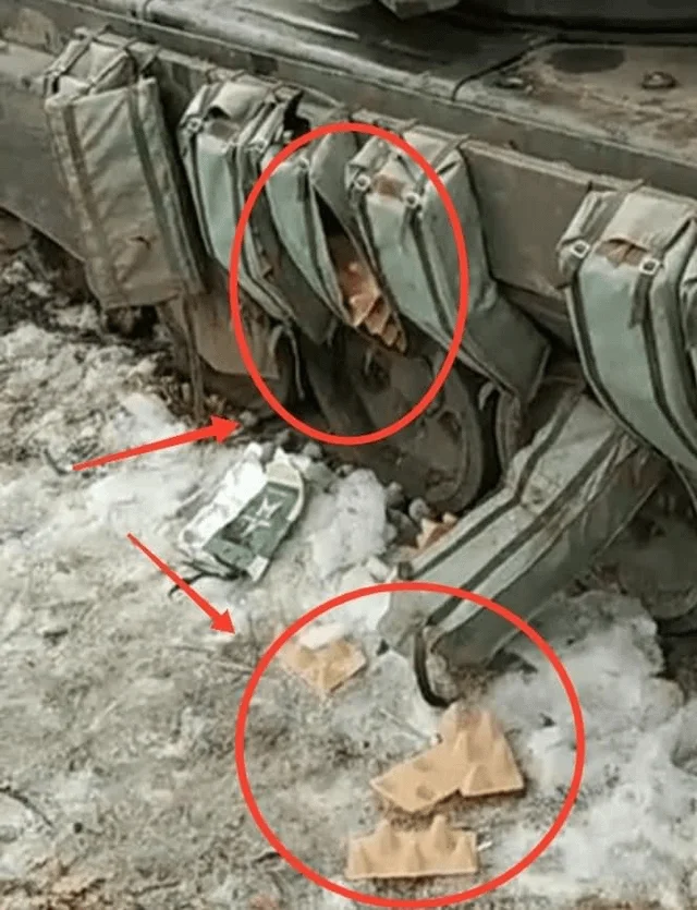 Explosive Reactive Armor Era — Close-up of empty Russian tank reactive armor blocks with cardboard fillers in the snow, marked with red circles