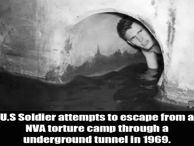 Fake History — Man's head emerging from water in a dark tunnel, captioned as a US soldier escaping an NVA camp in 1969
