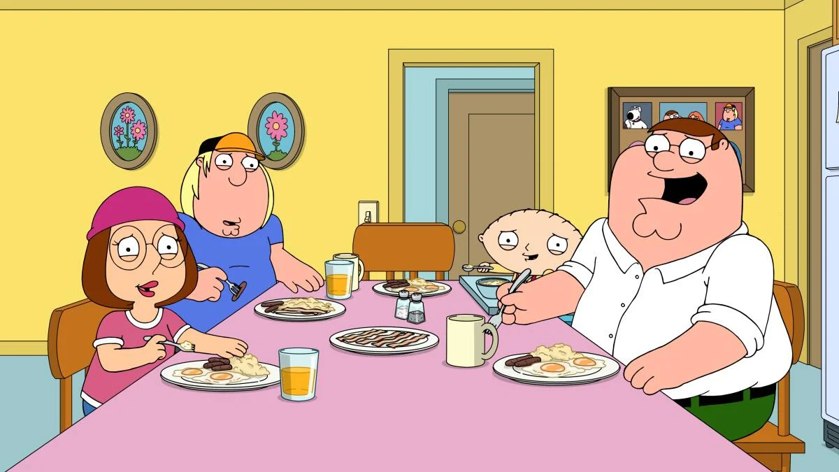 Family Guy Effect — The Griffin family from Family Guy eating breakfast together at the kitchen table.